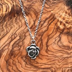 Antiqued Silver Rose Necklace By Feminine Edge. Silver Plated Necklace Chain With Lobster Clasp Measures 24 3/8" Long. Length Is Adjustable. Rose Pendant Measures 1 5/8". Total Length = 26". See Closet For Matching Earrings. Metal Rose Design Jewelry For Valentine's Day, Valentine's Day Metal Jewelry With Rose Design, Rose Metal Jewelry For Gift, Adjustable Rose Gold Necklaces With Rose Design, Adjustable Rose Gold Necklace With Rose Design, Silver Metal Necklace With Rose Design, Nickel-free Rose Flower Jewelry, Silver Rose Design Metal Necklace, Silver Rose Design Necklace