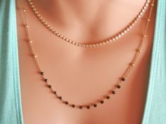 delicate rose gold choker necklace gold chain necklace dainty gold choker gold chain choker black necklace spinel rosary satellite necklace This is a gorgeous necklace that can be worn everyday or on special occasions! This necklace has two parts: the satellite chain necklace part and the black spinel rosary bar /part. This chain rosary necklace is available in gold and rose gold finish! Black spinel stones are tiny and faceted which give a sparkling touch to your look! A beautiful satellite and Dainty Jewelry With Beaded Chain For Layering, Delicate Jewelry With Tiny Beads For Layering, Dainty Beaded Chain Jewelry For Layering, Delicate Layering Jewelry With Tiny Beads, Elegant Rose Gold Jewelry With Tiny Beads, Elegant Satellite Chain Layered Choker Necklace, Delicate Double Chain Choker Jewelry, Elegant Black Layered Necklace As Gift, Elegant Black Layered Necklace For Gift