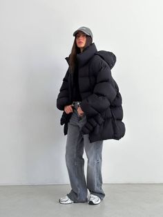 "Step into cold weather with an oversized winter jacket. Long sleeves and water repellent fabric finish - which encourages water to bead off its surface.  Plush poly fill adds extra warmth - 100% Recycled Polyester. Suitable for temperatures up to -20С / -4.0℉ More jackets here: https://www.etsy.com/shop/ArtVyshyvankaUA?ref=seller-platform-mcnav§ion_id=39368873 🔷Model is 168cm/5'5\" and wearing size S ----------------------------------------------------------------------------------------------------- 🔷DETAILS: -front zip closure -long sleeves -water repellant ----------------------------------------------------------------------------------------------------- 🔷CARE: machine washable 30-40C (95-105F)  -------------------------------------------------------------------------------------- Big Puffer Jacket, Oversized Casual Winter Puffer Jacket, Black Puffer Winter Outerwear, Black Puffer Outfit, Long Puffer Coat Outfit, Oversized Winter Puffer Jacket With Double-lined Hood, Oversized Black Techwear Puffer Jacket, Black Puffer Jacket With Double-lined Hood For Streetwear, Puffer Coat Outfit