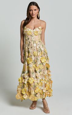 Amalie The Label - Mia Strappy Flower Detail Midi Dress in Yellow | Showpo USA Spring Floral Embroidered A-line Maxi Dress, Spring Floral Applique Midi Dress For Garden Party, Spring Wedding Midi Dress With Floral Embroidery, Summer A-line Midi Dress With Floral Applique, Spring Floral Applique Midi Dress, Floral Embellished Dress For Garden Party, Summer A-line Dress With Floral Applique, Spring A-line Midi Dress With Floral Embroidery, Spring Midi Dress With Floral Applique