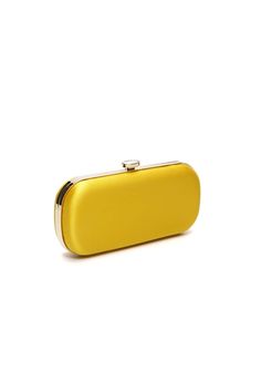 The Limoncello Yellow Bella Clutch is a bold yellow bridal handbag, crafted with duchess satin by Italian artisans featuring a lively pop of color. Size Petite: 8" x 4" x 2" Details: Italian Duchess Satin, hardshell metal frame, fabric interior with pocket, top clasp closure Planning a maximalist wedding day or looking to make a powerful statement at your next gala? Inspired by Italy’s Amalfi Coast, a coastline featuring terraced vineyards and cliffside lemon groves, this luxury handbag will mak Classic Yellow Evening Bag, Chic Yellow Rectangular Clutch, Chic Yellow Clutch For Gift, Chic Yellow Clutch As Gift, Chic Yellow Clutch For Formal Occasions, Chic Yellow Clutch As A Gift, Yellow Elegant Clutch For Formal Occasions, Elegant Yellow Clutch For Formal Occasions, Elegant Yellow Formal Clutch