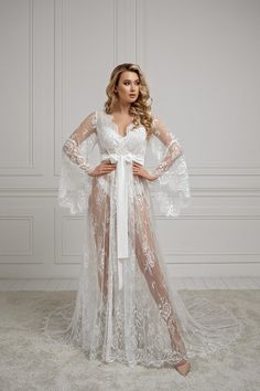 Beautiful long lace bridal robe, the perfect touch to your special day! Make your wedding photos even more memorable by wearing this stunning lace robe while getting ready. Sheer Bridal Gown, Celestial Realm, Wedding Nightgown, Ethereal Elegance, Bridal Nightwear, Lace Bridal Robe, Bridal Robe, Wedding Robe, Night Dress For Women