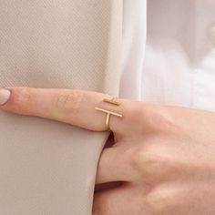 Introducing our Plain Cuff Ring, a minimalist masterpiece. Crafted in your choice of 14k solid gold, this unique open T-bar ring features an adjustable double bar design. Its simplicity and asymmetry make it an elegant choice for women who appreciate contemporary jewelry.  The ring can be made with yellow, rose, or white gold, please choose your size from the dropdown menu options above. 𝐑𝐢𝐧𝐠 𝐃𝐞𝐭𝐚𝐢𝐥𝐬 ❥ Solid gold, available in 10, 14 & 18 karats. ❥ Gold Color Options: White Gold, Yell Modern Initial Ring With Simple Open Design, Modern Initial Ring With Open Design, Modern Open Initial Ring With Simple Design, Minimalist Yellow Gold Initial Ring With Open Band, Modern Initial Open Ring With Simple Design, Modern Initial Ring With Simple Design, Minimalist Open Initial Ring, Plain Rings Gold For Women, Modern 14k Gold Open Midi Rings