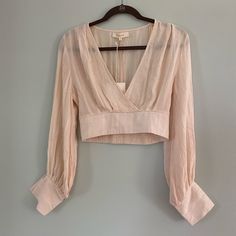 Fanco Size Small . Brand New Never Worn. Tags Still On. Long Sleeve V-Neck Cross Crop Top And Baby Pink Beige V-neck Crop Top For Fall, V-neck Crop Top For Brunch In Fall, Fall V-neck Crop Top For Brunch, Fitted Beige V-neck Crop Top, Fitted V-neck Top For Spring Day Out, Spring Long Sleeve V-neck Top For Brunch, Long Sleeve V-neck Top For Summer Brunch, Beige V-neck Crop Top For Spring, Fitted V-neck Crop Top For Brunch