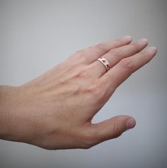 Silver ring Swallows with hot enamel of red color - one of the first rings in history of Dari jewelry brand and one of the most popular as well. Be free like a bird!https://www.etsy.com/listing/553811340/ - Ring Swallows without enamelhttps://www.etsy.com/listing/567157714/ - Ring Blue Swallowshttps://www.etsy.com/listing/580566473/ - Ring Black SwallowsThis ring perfectly combines with : https://www.etsy.com/listing/539814068/ - Earrings Swallowshttps://www.etsy.com/listing/554958693/ - Pendant Red Inlay Ring Jewelry, Red Ring With Inlay, Red Inlay Ring, White Engraved Ring As Fine Jewelry Gift, White Open Ring With Enamel, White Engraved Ring Fine Jewelry For Gift, Enamel Open Promise Ring, White Engraved Ring As Gift, White Enamel Rings With Polished Finish