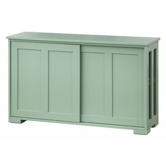 a green cabinet with doors and drawers