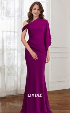 a woman in a purple gown posing for the camera with her hands on her hips