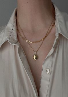 Home is where the heart is. Our Maison Gold Lockets are heirlooms that represent a moment in time. Keep this locket as a family heirloom forever. Wear her blank or get her engraved with your signature letter. To engrave more than one letter, visit HERE.Already have a chain? To purchase the locket individually, visit HERE. Photo dimensions: 14mm x 11.5mmTo add a photo inside, simply open the locket and carefully press the photo into place. Our lockets do not have a separate opening for a photo. F Gold Lockets, Oval Locket Necklace, 10k Gold Chain, Artsy Jewelry, Necklace Photo, Engraved Locket, Fall Rings, Oval Locket, Photo Dimensions