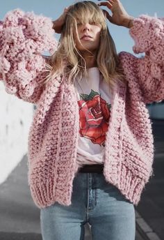 Cardigan season is right around the corner and this thick candy pink knit sweater is the perfect pop of color to splash into you.    Open front  Handmade chunky knit  Pom-Pom sleeves  Ribbed cuffs and hemline  Knit fabric provides flexibility  Not lined  100% Acrylic  Hand wash/Dry clean    size & fit      CM   IN                    Size         Length         Bust         Shoulder  Sleeves                   XXS/XS         69         Free         40         68                   S/M         70 Wide Sleeve Sweater, Sweater And Jeans, Pink Knit Sweater, Open Front Sweater, Chunky Cardigan, Inspo Outfit, Pink Cardigan, Outfit Look, Cool Sweaters