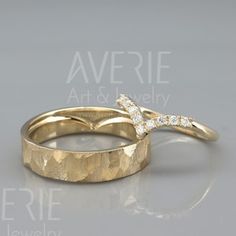 two gold wedding rings with diamond accents