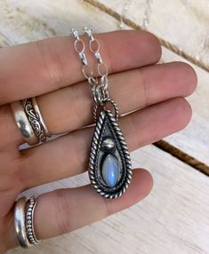 This pendant has been handcrafted from 925 sterling silver and 999 fine silver. Natural Rainbow Moonstone with sterling silver chain.  Length: 3.5cm Width: 1.8cm Please choose your necklace length or message me if you have any questions about chain lengths.  Two available but I can make similar custom orders.  If you would like a custom made piece, please get in contact, we have a selection of different stones. Instagram @kalahjewellery Sterling Silver Moon-shaped Crystal Necklace, Nickel-free Moonstone Necklace With Round Pendant, Moon-shaped Sterling Silver Crystal Necklace For Gift, Sterling Silver Multi-stone Spiritual Necklace, Rainbow Moonstone Pendant, Natural Rainbow, Sterling Silver Necklace, Sterling Silver Chain, Necklace Length