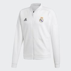 Real Madrid adidas Z.N.E. Jacket A Real Madrid jacket with relaxation built in. The adidas Z.N.E. collection was designed to keep athletes comfortable in the moments before competition. This Real Madrid anthem jacket is made of smooth fabric with a wide fit in the body. It's identical to the ones players wear as they emerge from the tunnel and step into the spotlight. Be ready in an instant A quick-release zip lets you tear the jacket off at a moment's notice Club details It features an embroide White Adidas Logo Functional Track Jacket, White Adidas Functional Track Jacket, White Functional Adidas Track Jacket, White Adidas Logo Functional Outerwear, White Adidas Functional Outerwear, White Functional Adidas Outerwear, Functional White Adidas Outerwear, Functional White Outerwear With Three Stripes Branding, White Long Sleeve Track Jacket With Adidas Logo