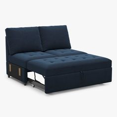 a blue sofa bed with two pillows on it's back and one arm folded open