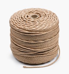 a spool of rope on a white background