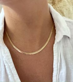 The Halo Herringbone Chain Necklace  D E T A I L S - Gold Filled Chain - 16", 18" or 20" Length of Chain - 4mm Thick - Lobster Clasp Closure M A T E R I A L S At Dylan Rae, we are committed to handcrafting jewelry that is perfect for everyday wear. Our high-quality gold filled designs contain 100+ times more real gold than gold plated components. The thick outer layer of gold makes it highly durable and safe for people with allergies or sensitive skin. C A R E Care for Your Gold Filled Jewelry: Necklace Snake Chain, Necklace Snake, Herringbone Chain, Herringbone Necklace, Snake Chain Necklace, Necklace Layering, Gold Choker, Layering Necklace, Gold Filled Jewelry