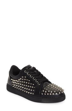 Gleaming metallic cone studs spike the upper of a leather low-top sneaker brightened up with a red logo-debossed tread. Lace-up style Wipe with a soft, dry cloth and store in a dust bag Leather upper/leather and textile lining/synthetic sole Made in Italy Edgy Lace-up Sneakers With Studded Rubber Outsoles, Edgy Studded Lace-up Sneakers, Streetwear Lace-up Sneakers With Rhinestone Rivets, Low-top Sneakers With Rhinestone Rivets For Streetwear, Spiked Lace-up Sneakers For Streetwear, Edgy Leather Sneakers With Spikes, Casual Low-top Sneakers With Rivets, Custom Sneakers With Spikes For Streetwear, Studded Lace-up Sneakers For Streetwear