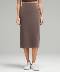 Feel it to believe it. From running errands to relaxed nights in, this lounge-worthy midi skirt dials up the softness. Designed for Casual. Hits below the knee to just above the ankle:Slim fit skims your body. Hand pockets with hidden card sleeve. Casual Pencil Skirt For Loungewear, Spring Midi-length Loungewear Bottoms, Spring Pencil Skirt For Loungewear, Relaxed Knee-length Skirt For Loungewear, Knee-length Relaxed Skirt For Loungewear, Lululemon Softstreme, Lululemon Skirt, Women Skirts, Peach Fuzz