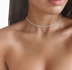 So excited to list our stunning Tennis necklace gifts for her. This popular style is perfect for wedding jewellery and bridesmaid gifts or bridesmaids jewellery. Available in Sterling silver 925 and 18k gold/rose gold plated. Dainty worn alone or stacked with necklace and watches with such high sparkle they will compliment any outfit from day to night. 🤍SIZE AND MATERIALS🤍 925 Sterling Silver With Platinum Plated Classic Square Tennis necklace Chokers - non tarnish necklace 925 sterling silver Silver Initial Pendant Jewelry For Party, Silver Initial Pendant For Party, Silver Initial Pendant Party Jewelry, Elegant Cubic Zirconia Initial Necklace Gift, Wedding Jewelry With Initials In Cubic Zirconia, Elegant Cubic Zirconia Name Necklace, Elegant Round Choker As Gift, Elegant Round Choker For Gifts, Elegant Personalized Necklaces For Party