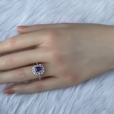 Details: Materials: Amethyst Gemstone, White Zircons, S925 Sterling Silver Plated with 18K White Gold Color: Purple Shape: Retangular Size: Adjustable and fitable for all Descriptions: This elegant ring has a 7x5mm amethyst and forty-four white zircons. Other than the stones, the ring is made out of S925 sterling silver plated with 18K white gold. A ring of small zircons outlined the amethyst. A circle zircon alternates with an oval zircon to create a pattern for the second outline of the ring. Natural Gemstone Ring, Amethyst Gem, Purple Band, Elegant Ring, Multi Stone Ring, Amethyst Gemstone, Amethyst Ring, White Gold Rings, Unique Rings