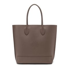 Mulberry Blossom tote in taupe nappa calf leather In 2016 Spring collection. Taupe / gray color durable tote bag. Like new (no scratch). Height 36cm Width 43cm Depth 12cm Handle drop 20cm. OBO. Very versatile as daily work bag. Received many compliments. Love the bag but got my eyes on something new :) Mulberry Bags Totes Mulberry Tote, Mulberry Purse, Taupe Purse, Taupe Handbag, Mulberry Handbags, Mulberry Bag, Flower Handbag, Flower Tote