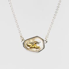 $332 - $440 depending on combination Handcrafted in Seattle *MADE TO ORDER - requires 4-5 weeks Materials: solid sterling silver solid 14k yellow gold diamonds Measurements: Adjustable necklace length: 17” - 19” Pendant size: .75” x .5” x .25” Diamonds: 2mm (.03 carat) Features: Versatile: Necklace is reversible - wear whichever side facing the world that gives you the most confidence that day. Adjustable necklace length accommodates varying necklines and tops High Quality - all connections are Minimalist Silver Jewelry With Single Cut Diamonds, Sterling Silver Gold Jewelry With Gemstone, Gold Sterling Silver Jewelry With Gemstones, Custom Sterling Silver Pendant Necklace In White Gold, Gold Sterling Silver Diamond Necklace For Formal, Gold Sterling Silver Diamond Necklace For Formal Occasions, Custom White Gold Sterling Silver Pendant Necklace, Oval Necklace With Single Cut Diamonds For Gift, White Gold Sterling Silver Necklace With Oval Pendant