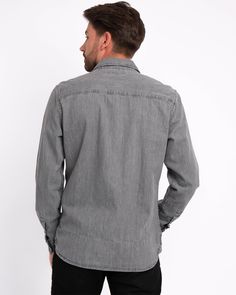 Amsterdam Heritage introduces the Flagler denim shirt for its menswear collection. Featuring a front pocket and snap button closure, the long-sleeved shirt is made from pure cotton, creating a lightweight and comfortable feel for the wearer. Adorned with our brand's logo, presented subtly in the back and side stitching, the Flagler is the ultimate classic denim shirt for every occasion. Never going out of style nor going out of season, style it with a blazer for a semi-casual look or match it wi Washed Black Cotton Button-up Shirt, Washed Black Cotton Shirt With Button Closure, Washed Black Button-up Shirt With Pockets, Washed Black Long Sleeve Denim Shirt, Washed Black Cotton Shirt With Pockets, Long Sleeve Washed Black Shirt With Button Closure, Washed Black Long Sleeve Shirt With Button Closure, Timeless Fashion Pieces, Scarf Jacket