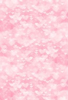 a pink background with lots of hearts on it