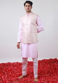 Art Silk Kurta in Baby Pink. This Readymade Chinese Collar Neck and Full Sleeve attire is Enhanced with Fancy Buttons, Resham and Sequins Work Available with a Cotton Silk Aligarhi Pant in White and an Art Silk Nehru Jacket in Baby Pink Do note: Footwear shown in the image is for presentation purposes only. Half to one inch may vary in measurement. (Slight variation in actual color vs. image is possible) We sell all kinds of menswear. Mens Kurta | Mens Kurta Pajama | Mens Sherwani | Mens Sherwan Designer Pink Nehru Jacket With Zari Work, Pink Nehru Jacket For Diwali With Traditional Drape, Pink Bandhgala With Chikankari Embroidery For Eid, Traditional Pink Bandhgala For Transitional Season, Pink Nehru Jacket With Zari Work For Festive Occasions, Pink Traditional Nehru Jacket For Festive Season, Pink Bandhgala With Resham Embroidery For Eid, Traditional Pink Bandhgala With Zari Work, Pink Bandhgala With Zari Work For Eid