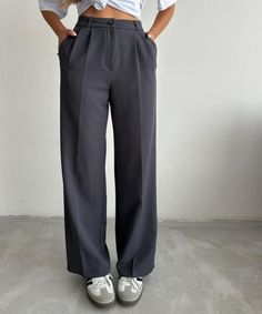 Introducing our Korean Wide Length Pants, perfect for both professional settings and casual wear. These pants feature a high-waisted design and a fluid wide-length silhouette that exemplifies modern elegance and comfort. Features: Material: Made with a smooth, high-quality fabric blend that offers both comfort and durability. Special Features: These pant come with a sleek, button closure and deep pockets for functionality without compromising style. Technical Specifications: Tailored to maintain Modern Straight Dress Pants For Work, Modern Wide-leg Dress Pants With Pockets, Elegant Gray Bottoms With Pockets, Elegant Gray Wide Leg Pants For Spring, Solid Color Straight Dress Pants For Workwear, Gray Wide Leg Full Length Pants For Formal Occasions, Solid Straight Dress Pants For Workwear, Casual Wide Leg Bottoms For Office Wear, Versatile Wide Leg Formal Pants With Pockets