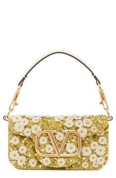 Destined to become Valentino's 'It' bag of the season, this adaptable bag is crafted from lambskin leather and embellished with beads and blooming daisies. A top handle and pull-through chain strap—both detachable—offer carrying options for the covetable look. Magnetic-snap flap closure Removable top carry handle; removable pull-through chain strap Interior wall pocket Leather Made in Italy Designer Handbags Dior Her, Celebrity Handbags, Painted Purse, Valentino Bag, Yellow Purses, Valentino Handbags, Colorful Outfit, Paint Inspo, Embellished Bags