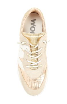 Channel sporty-chic style in this logo-embellished sneaker featuring a gel insole and shock-absorbing outsole. Lace-up style Memory gel cushioned insole WondersFly outsole with XL EXTRALIGHT® technology provides shock-absorbing comfort Leather and textile upper/leather lining/synthetic sole Made in Spain Wedge Sneakers With Boost Midsole And White Sole, Sporty Gold Sneakers For Spring, Sporty Wedge Sneakers With Textured Sole, Synthetic Wedge Sneakers With Cushioned Footbed For Sports, Modern Sports Sneakers With Removable Insole, Modern Lace-up Wedge Sneakers For Sports, Modern Sneakers With Ortholite Insole For Jogging, Sports Wedge Sneakers With Textured Sole, Gold Synthetic Sneakers For Spring