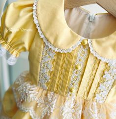 Elegant Doll Collar Dress For Dress-up, Elegant Dress With Doll Collar, Elegant Doll Collar Dress, Elegant Princess Dress For Fancy Dress Occasion, Yellow Baptism Dress For Summer, Yellow Summer Dress For Baptism, Yellow Fitted Dress For Dress-up, Elegant Summer Princess Dress With Lace Trim, Lace Trim Princess Dress For Dress-up