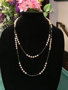 "This piece was designed to copy an actual necklace worn by Lady Mary in the PBS series Downton Abbey. This necklace is 50\" of glittering faceted gold natural iron pyrite beads interspersed with mint condition 6mm vintage cream faux Majorca pearls OR genuine AAA freshwater pearls (choose when you checkout). This is a VERY long necklace; it measures 50\" total from top to bottom. It can be worn as one long necklace (if you're tall or channeling your inner flapper) but it's also meant to be loope Formal Double Strand Pearl Chain Necklace, Formal Double Strand Long Necklace, Elegant Double Strand Long Necklace For Formal Occasions, Handmade Elegant Long Chain Necklace, Elegant Handmade Long Chain Necklace, Gold Single Strand Jewelry For Evening, Single Strand Gold Jewelry For Evening, Elegant Double Strand Evening Jewelry, Elegant Double Strand Long Necklace For Gifts