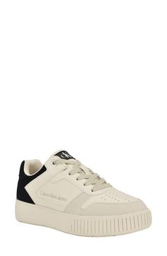 This easy-to-style sneaker gives a sporty cool kick to everyday ensembles. Lace-up closure Synthetic upper/textile lining/synthetic sole Imported Casual Basketball Shoes With Contrast Sole, Synthetic Lace-up Skate Shoes In Athleisure Style, Calvin Klein Sporty Sneakers With Round Toe, Sporty Synthetic High-top Sneakers With Vulcanized Sole, Urban Style Synthetic Basketball Shoes With Contrast Sole, Urban Style Basketball Shoes With Contrast Sole, Calvin Klein Sporty Low-top Sneakers, Calvin Klein White Sporty Sneakers, Casual Low-top Cushioned Basketball Shoes