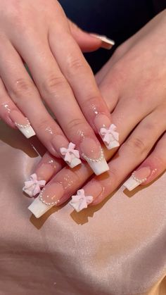 White french tip nails with pearls and pink bows🎀🤍 Charms Nails Ideas, 15 Nails Ideas Pink, No French Tip Nails, Middle Nails Ideas, Pearl Pink French Tip Nails, Pink And White Set Nails, French Tip With Stones, Pink French Tips With Pearls, Pearl And Bow Nails