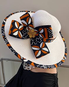 ombines timeless elegance with vibrant cultural flair. Handcrafted with care, this hat features a beautifully woven straw base adorned with bold African print fabric, offering both style and sun protection. Perfect for church services, outdoor events, or simply adding a touch of sophistication to your outfit, this hat blends tradition with modern design. Lightweight and breathable, it's as comfortable as it is striking. Elevate your look with a hat that celebrates heritage and craftsmanship. One size: should fit all. **** The straw hat color might vary from white to Beige. White Panama Hat For Vacation At Kentucky Derby, Traditional Straw Hat For Summer Beach, Traditional Summer Straw Hat With Curved Brim, Traditional Short Brim Hat For Summer, Traditional Short Brim Summer Hat, Traditional Summer Sun Hat For Beach, Traditional Straw Hat For Summer Vacation, Traditional Summer Straw Hat For Vacation, Traditional Wide Brim Straw Hat For Summer