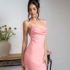 Features: Introducing our Spaghetti Satin Long Dress for women - the perfect addition to your wardrobe. This backless, pleated dress features a sexy high waist design and a halter neckline, making it the ideal choice for any elegant party look. Made with high-quality satin material, this dress is both comfortable and stylish. Elevate your fashion game with this must-have piece. Elegant Backless Midi Dress With Built-in Bra, Chic Halter Neck Dress With Built-in Bra, Backless Party Midi Dress With Built-in Bra, Elegant Suspender Dress With Built-in Bra, Backless Midi Dress With Built-in Bra For Date Night, Elegant Sleeveless Backless Dress With Built-in Bra, Satin Dress With Spaghetti Straps And Built-in Bra, Evening Backless Midi Dress With Adjustable Straps, Evening Slip Dress With Straps, Midi Length