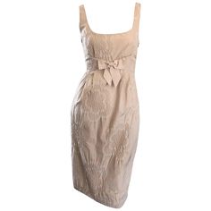 Adorable 1990s MOSCHINO CHEAP & CHIC khaki / beige sleeveless babydoll dress! Features embroidered flowers throughout, with a chic bow detail at upper waist. Hidden zipper up the side with hook-and-eye closure. In great condition. Made in Italy Marked Size US 4 Measurements: 32 inch bust 26 inch waist 36 inch hips 37 inches from top back shoulder seam to hem Vintage 90s Dress, Sunday Dress, Moschino Cheap And Chic, Designer Evening Dresses, 90s Dress, Vestidos Vintage, Feel Pretty, Gianni Versace, Floral Vintage