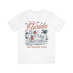 Looking for a stylish and unique gift? Check out our Welcome to Florida Vintage Tshirt! This vintage tee is the perfect addition to any wardrobe and makes for a great gift for her or him. With a custom design and high-quality graphic tee printing, this tshirt is perfect for any occasion, from birthdays to retro-inspired events. Available in a variety of sizes and styles, including custom tees for women, our Welcome to Florida Vintage Tshirt is a trendy and fashionable choice. So why wait? Order your Welcome to Florida Vintage Tshirt today and add some retro-inspired flair to your wardrobe! .: 100% Airlume combed and ringspun cotton (fiber content may vary for different colors) .: Light fabric (4.2 oz/yd² (142 g/m .: Retail fit .: Tear away label .: Runs true to size Retro White Print Crew Neck T-shirt, Summer Gift T-shirt With Text Print, Retro Pre-shrunk Ring-spun Cotton T-shirt, Vintage Cotton T-shirt As Gift, Vintage Custom Print T-shirt For Fan Merchandise, Retro White Letter Print T-shirt, Retro White T-shirt With Letter Print, Retro Relaxed Fit T-shirt With Sublimation Print, Retro T-shirt With Sublimation Print, Relaxed Fit