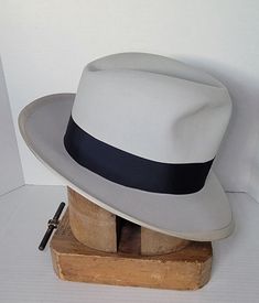 Elevate your style with this beautiful vintage men's Stetsonian Stetson fedora hat. Crafted from high-quality materials, this hat is the perfect addition to any wardrobe. With its classic design and versatile color, wide brim tall crown make it a must-have for any fashion-forward individual who wants to make a statement. Its timeless design and superior craftsmanship ensure that it will be a staple in your wardrobe for years to come. Invest in this vintage accessory today and add a touch of soph Stetson Fedora, Tall Crown, Hat Blocks, Lake Elsinore, Mens Vintage, Fedora Hat, Wide Brimmed, Vintage Accessories, Vintage Men