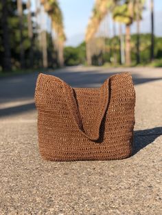 Any woman must have this bag for every fashionista.Whether you keeping it to yourself or gifting someone you care, it will be unforgettable. ✔️I made this beautiful bag from brown natural paper rope which is organic cotton. ✔️The interior of the straw summer bag has a magnetic button. Suitable for use as shoulder bag, beach bag or party bag ✔️You can combine your clothes with a straw summer bag on summer days ✔️Handcrrafted in Turkey ✔️Hand-crocheted with care ✔️This bag is light weight yet dura Casual Everyday Bags Made Of Natural Fiber, Chic Travel Straw Pouch Bag, Natural Pouch Shoulder Bag For Vacation, Eco-friendly Brown Shoulder Bag For Vacation, Natural Color Pouch Shoulder Bag For Vacation, Brown Rectangular Hobo Bag For Summer, Trendy Brown Straw Bag For Travel, Trendy Natural Color Hobo Bag In Pouch Shape, Trendy Natural Color Hobo Bag Pouch