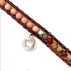 Nwt! Handmade, Leather Wrap Bracelet Made With 4mm Unakite And Rosewood Beads. Features A Small, Silver-Tone Butterfly Charm To Remind Us Of Our Own Ripple Effect On The World. Brown Leather Beaded Wrap Bracelet, Brown Leather Wrap Bracelet For Festivals, Adjustable Brown Leather Bracelet With Natural Stones, Brown Round Beads Wrap Bracelet Gift, Earthy Brown Wrap Bracelet With Round Beads, Brown Hand Wrapped Wrap Bracelet As Gift, Brown Leather Bracelet, Hand Wrapped For Everyday Wear, Brown Waxed Cord Wrap Bracelet As Gift, Brown Hand Wrapped Wrap Bracelet Gift