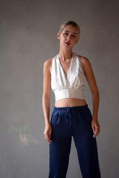 "The silk pants is perfect for wearing at home or as street style outfit 100 % designed and handmade by Emsilk. I am pleased to offer your garments made to measure at no extra cost and you can choose any color you like. * Detail: - Basic pants with elasticized waist band and gathered on hem - Side pockets - The model is 5'6\" tall and wearing size S. * Care: - Dry clean or machine washed with cold water setting and mesh washing bag. - Iron on the back side with NO steam setting. * Shipping: - It Basic Pants, Pants And Top, Silk Romper, Silk Set, Silk Dress Long, Silk Trousers, Sleep Shorts, Pants White, Silk Pants