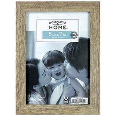 a wooden frame with an image of two people kissing and the words complete home on it