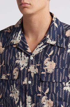 Dashes and blooms bring summery style to a casual camp shirt woven from a comfortable cotton blend with handsome mother-of-pearl buttons. 29" length; 44" chest (size Small) Front button closure Convertible collar Elbow-length sleeves Chest flap-patch pockets 53% cotton, 47% lyocell Tencel lyocell is a more-sustainably produced fiber made with closed-loop processing Machine wash, dry flat Made in Turkey Convertible Collar, Navy Print, Camp Shirt, Mother Of Pearl Buttons, Pearl Buttons, Elbow Length Sleeve, Camping Shirt, Chest Size, Mother Of Pearl