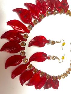 Ready to Ship! CUSTOM Length will come in a a gift box This is an unique Carved Red(Dyed) Coral Leaf beaded and champagne color crystal necklace.   I made this versatile chunky red necklace with dyed red leaf shape coral bead and crystal bead. Size: Custom Length . Sometimes we need a nice necklace to make our outfit look more dressy, this bright red necklace is perfect for that. This chic and unique necklace add an elegance look to your outfit which will work with any outfit, dressy or casual!! Red Jewelry Set, Red Boho, Coral Stone, Natural Coral, Coral Earrings, Red Necklace, Champagne Color, Coral Beads, Chunky Necklace