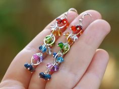 "THE JEWELRY IS SHIPPED via DHL EXPRESS (2-5 days delivery door to door). THE DHL SHIPPING COST IS INCLUDED IN THE PRICE. The Carnival Earrings - Rainbow Gemstone Chain Earrings ► Measurements / Details: - Length of the earrings including earwire (5 hoops chain): 2.16\" (5.5 cm) *can be made longer/shorter per request - Gold: High quality Gold Filled - Silver: High quality Sterling Silver (in the 3rd photo you can see these earrings in Silver metal) ► Gemstones: The earrings include AAA quality Multicolor Nickel Free Drop Crystal Earrings, Multicolor Nickel-free Drop Crystal Earrings, Nickel-free Multicolor Drop Crystal Earrings, Nickel Free Multicolor Drop Crystal Earrings, Multicolor Crystal Dangle Earrings, Multicolor Dangle Crystal Earrings With Ear Wire, Multicolor Nickel-free Dangle Crystal Earrings, Multicolor Nickel Free Dangle Crystal Earrings, Rainbow Sterling Silver Jewelry