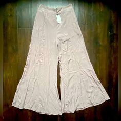 Nwt Boutique Flawless Wide Leg Pink Palazzo Pants Women’s Dress Pants Medium M New With Tags! Popular Boutique Brand Flawless Size: Medium Wide Flowy Legs Pockets At The Hips Pretty Blush Pink Color Elastic Waist For A Perfect Fit! Lining Around The Top So That You Can’t See Through Them Spring Flare Wide Leg Pants With Elastic Waistband, Summer Rayon Trousers, Fitted Bottoms With Elastic Waistband For Brunch, Fitted Wide Leg Pants For Summer, Rayon Trousers For Day Out, High-waisted Rayon Pants For Spring, Summer Wide Leg Rayon Bottoms, Rayon Bottoms For Day Out, Fitted Rayon Bottoms For Day Out