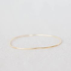 Solid gold bangle. Looks beautiful stacked with other bracelets or simply worn solo.Length: 7.5" Solid Gold Bangle, Simple Bangle, Accessories Gold, Bag Icon, Gold Bangle, Instagram Icons, Arm Candy, Gold Bangles, Solid Gold