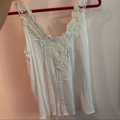 Cute White Top With Tag Still Attached. Price Is Marked Out Because It Probably Was A Gift. I’ve Never Worn It! Feminine White Camisole With Lace Top, Feminine White Lace Top Camisole, Feminine White Lace Camisole, Vacation Tank Top With Lace Trim, White Summer Vest Top, Lace Trim Tank Top For Day Out, Feminine Lace Tank Top For Day Out, White Feminine Tank Top With Lace Trim, White Sleeveless Crochet Top For Vacation